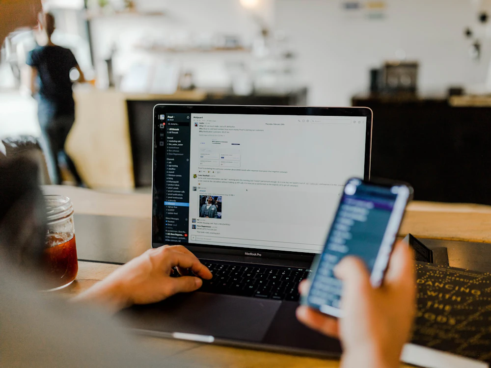 A listener opening a podcast support link on a phone